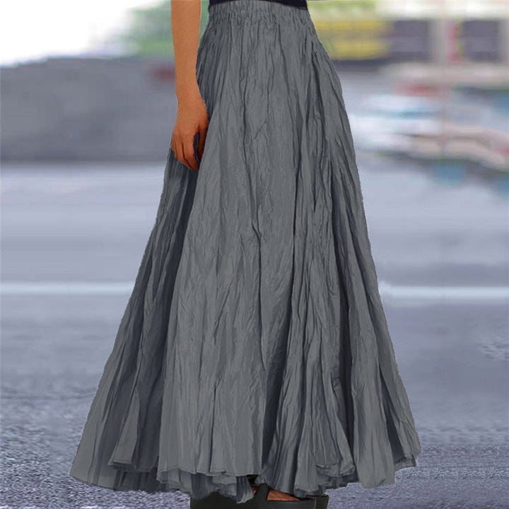 Soft women's pleated A-line maxi skirt with a flexible elastic waist for all-day comfort.