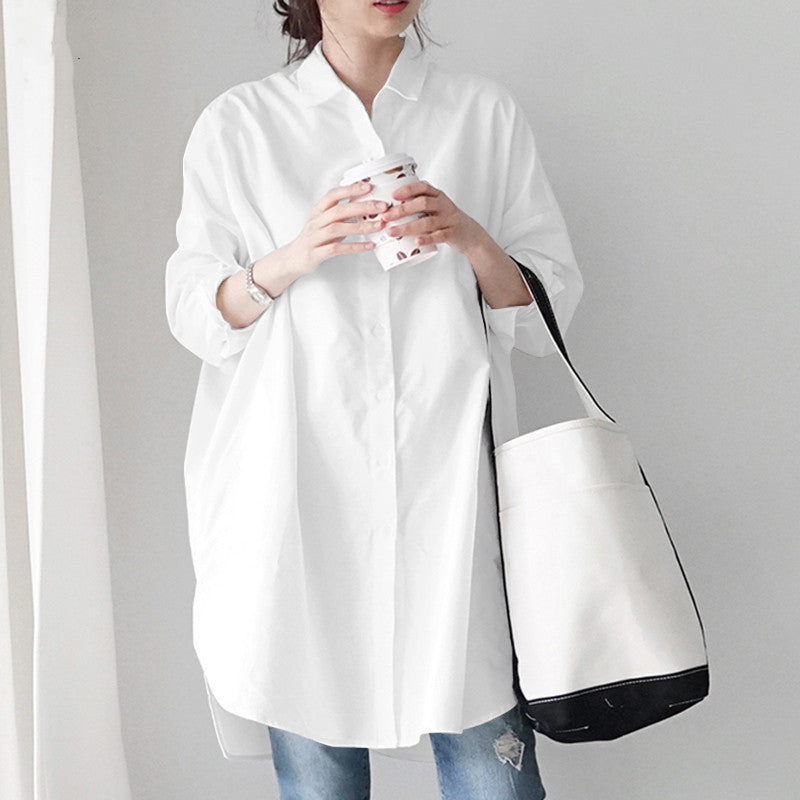 Loose fit button-front tunic blouse, women's plus size long sleeve fashion top.