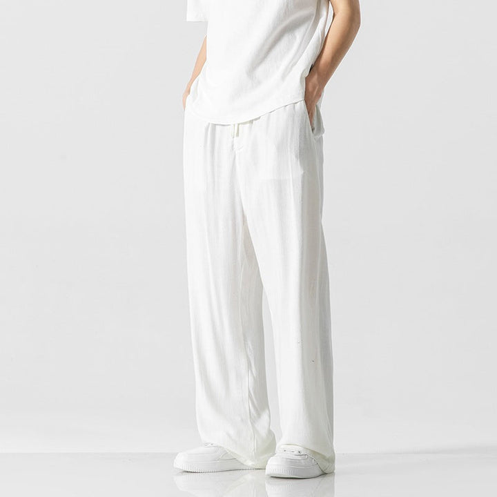 Men's comfy loose fit casual pants, full length with an adjustable drawstring waist for daily wear.