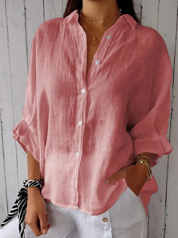 Lightweight women's loose top, breathable and stylish for warm weather elegance.