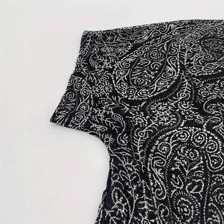 Stylish women's black patterned kimono jacket. A trendy and versatile cover-up for any elegant casual look.