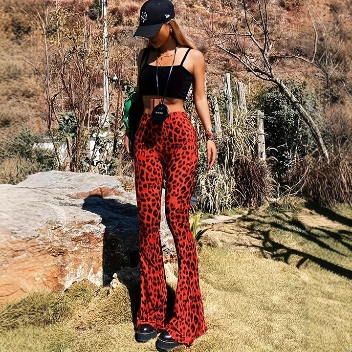 Detailed view of chic leopard print on comfortable flared leggings for women.