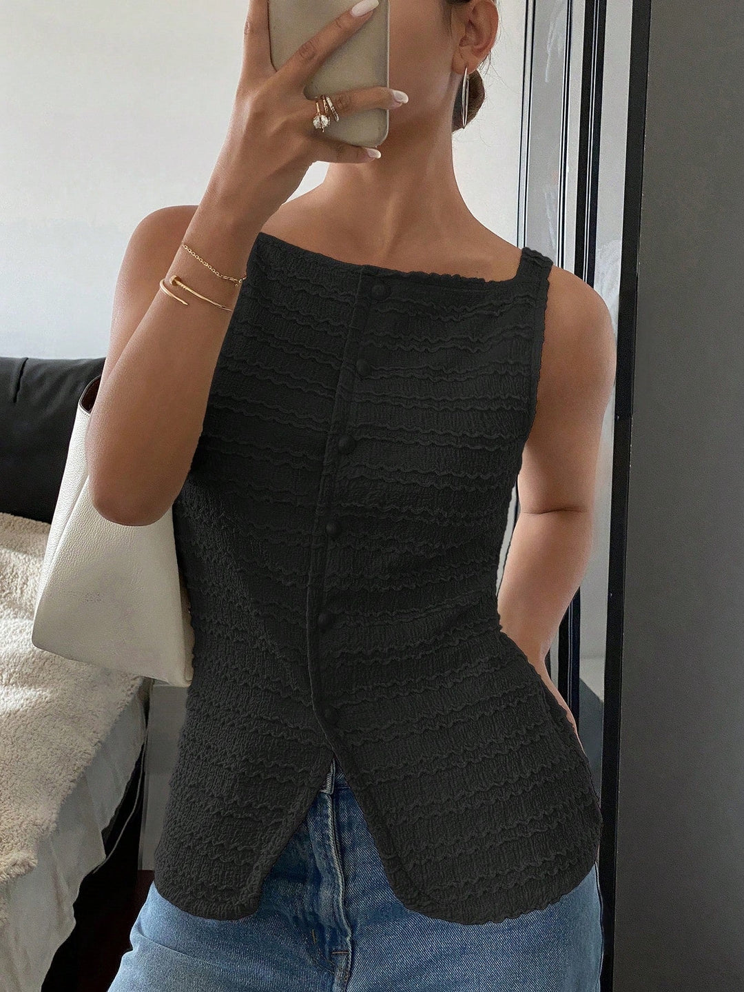 Sophisticated women's button-front sleeveless outerwear vest. Trendy layering piece for spring & autumn fashion.
