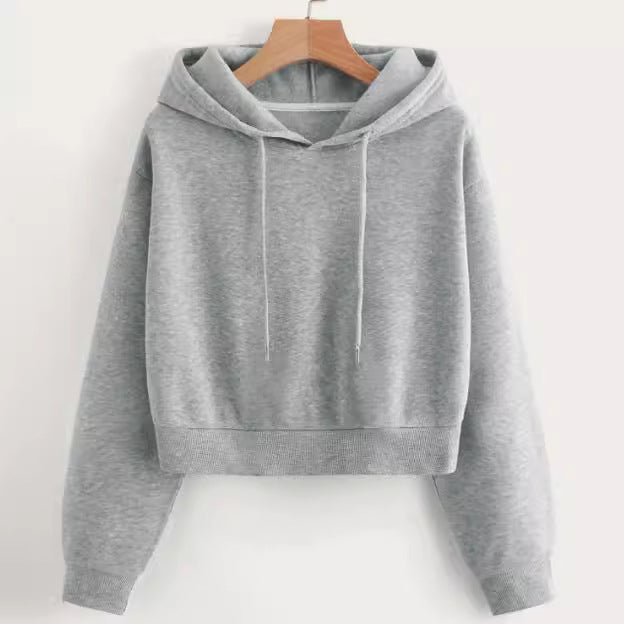 Close-up of soft, comfortable fabric on a women's cropped pullover hoodie.