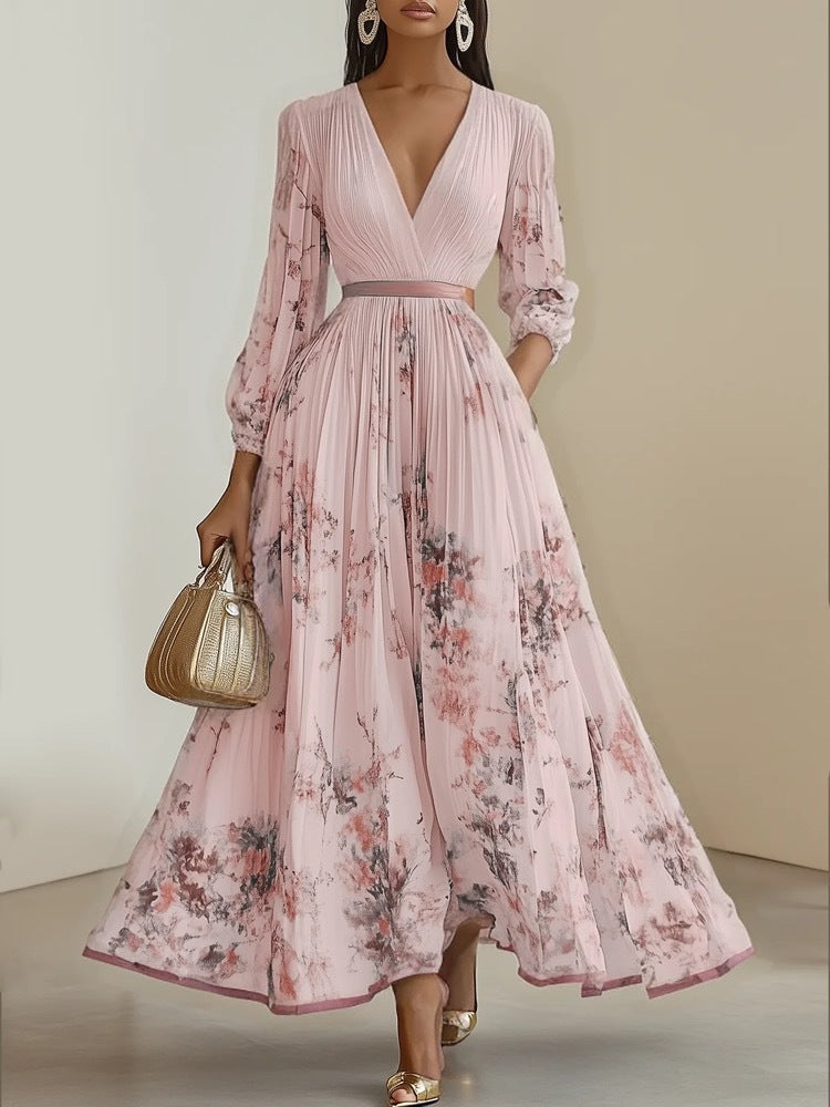 Flowy floral V-neck maxi dress for women, with elegant design and long puffed sleeves, great for summer parties.