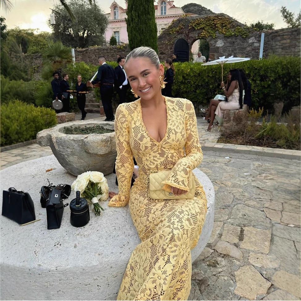 Stylish yellow women's V-neck lace maxi dress with voluminous sleeves, perfect for elegant evening events.