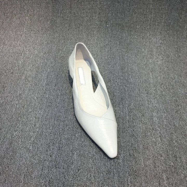 Essential women's pointed toe ballet flats, comfortable & elegant everyday slip-on footwear.