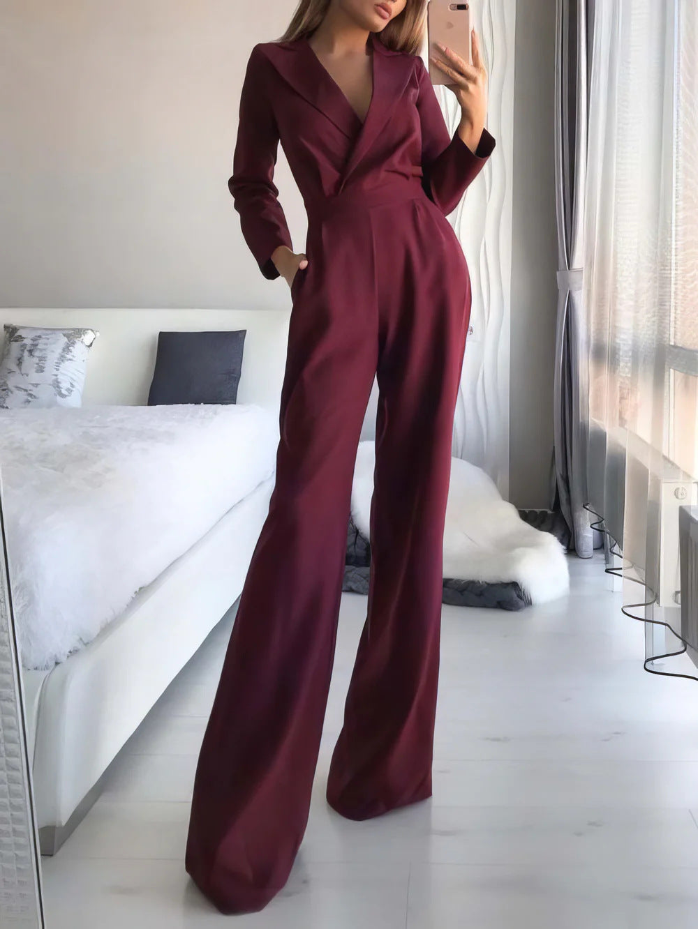 Chic women's long sleeve wide-leg V-neck jumpsuit, a stylish choice for evening wear & special occasions.