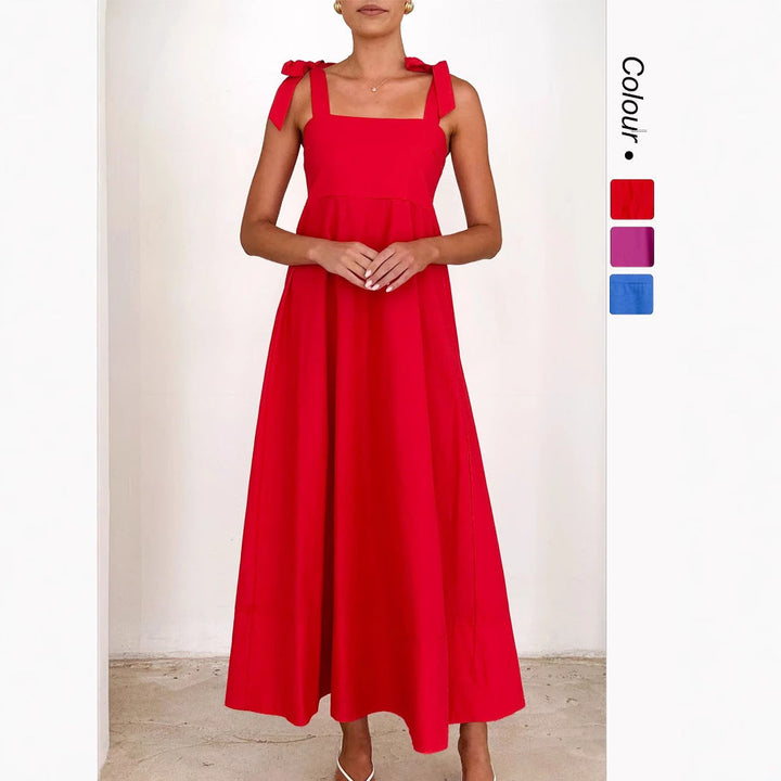 Elegant red maxi dress for women with delicate adjustable straps, perfect for evening wear.