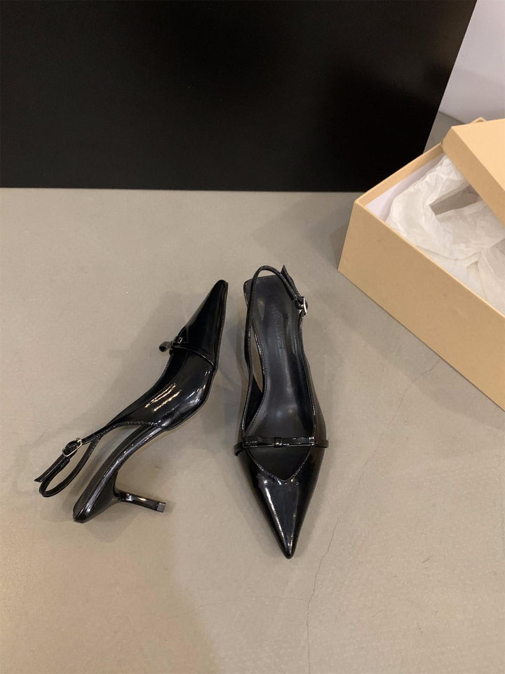 Fashionable women's pointed-toe slingback pumps, fine strap design; elegant and modern women's shoes.
