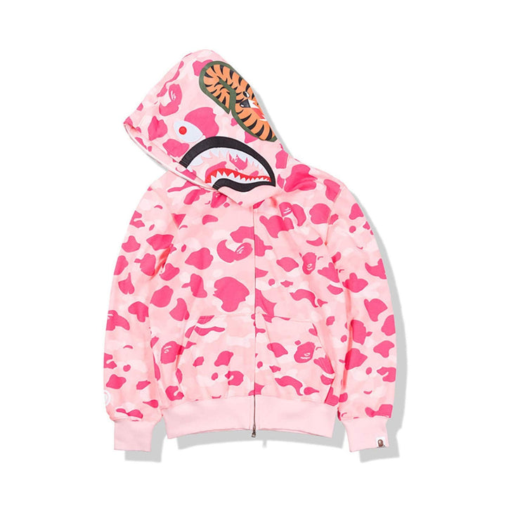 Detailed view of the hood on a women's camouflage pullover. Fashionable hooded sweatshirt for street style.