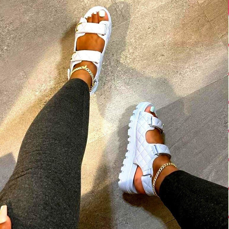 Fashionable open-toe women's platform sandals, perfect for stylish casual summer outfits with non-slip sole.