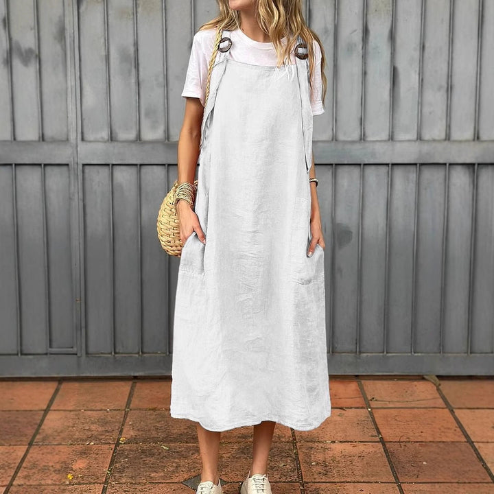 Stylish women's casual dress, relaxed fit, comfy for summer, with V-neck & adjustable straps.