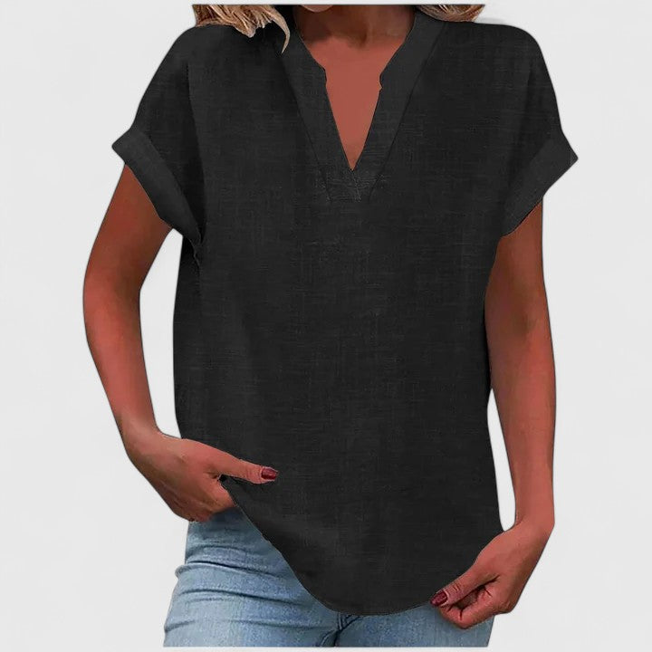 Stylish women's V-neck blouse, versatile for work or casual outfits.