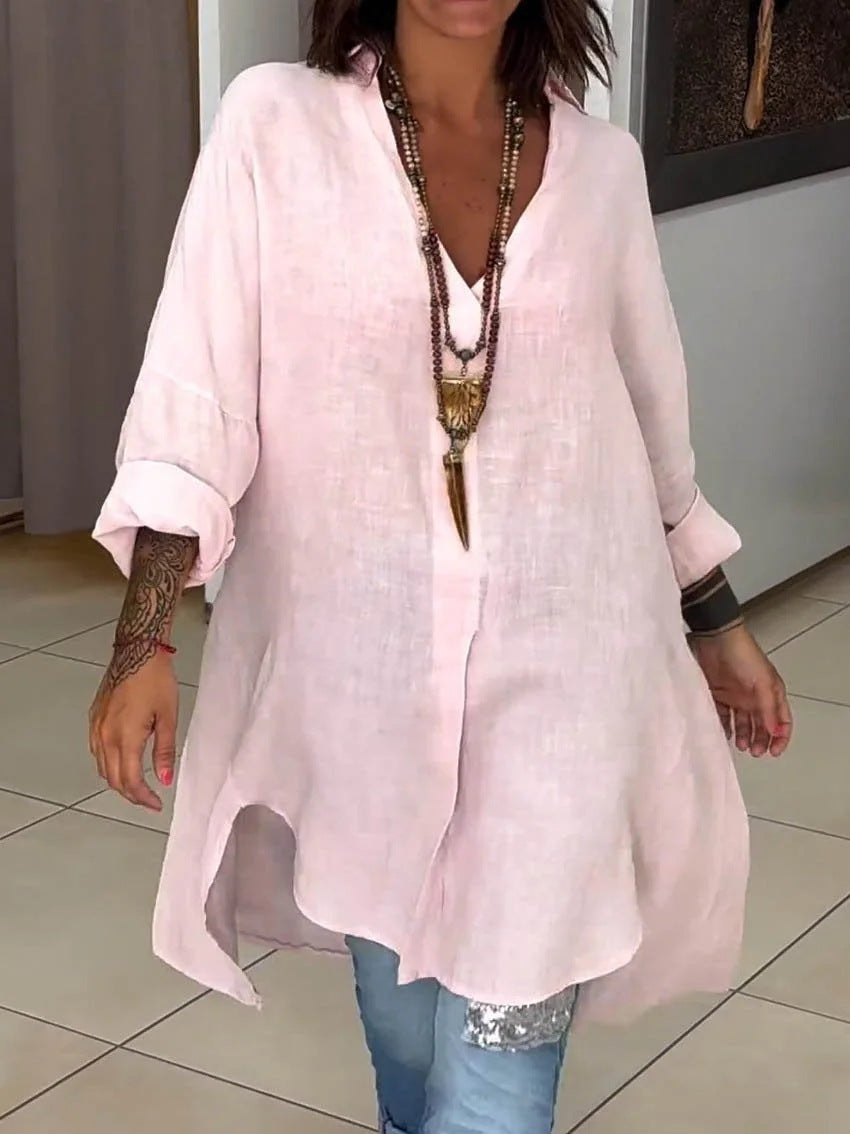 Relaxed fit women's collared shirt, versatile button-down top with roll-up sleeves for everyday wear.