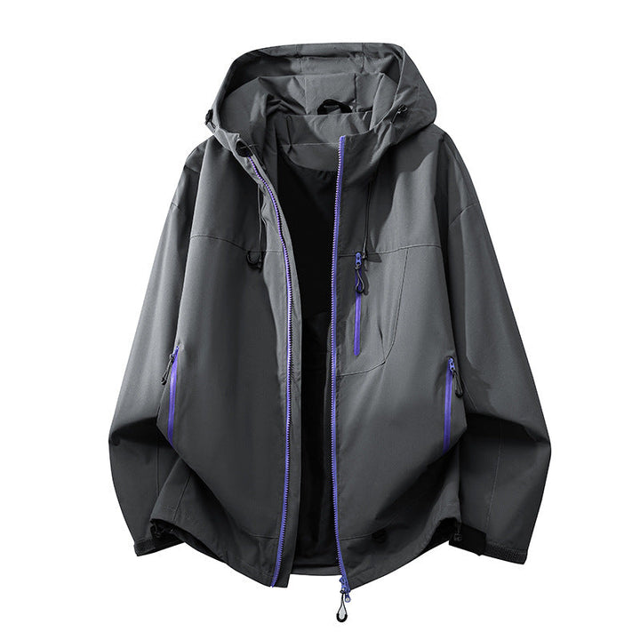 Women's waterproof technical outdoor jacket, windbreaker with adjustable hood & multi-pockets.