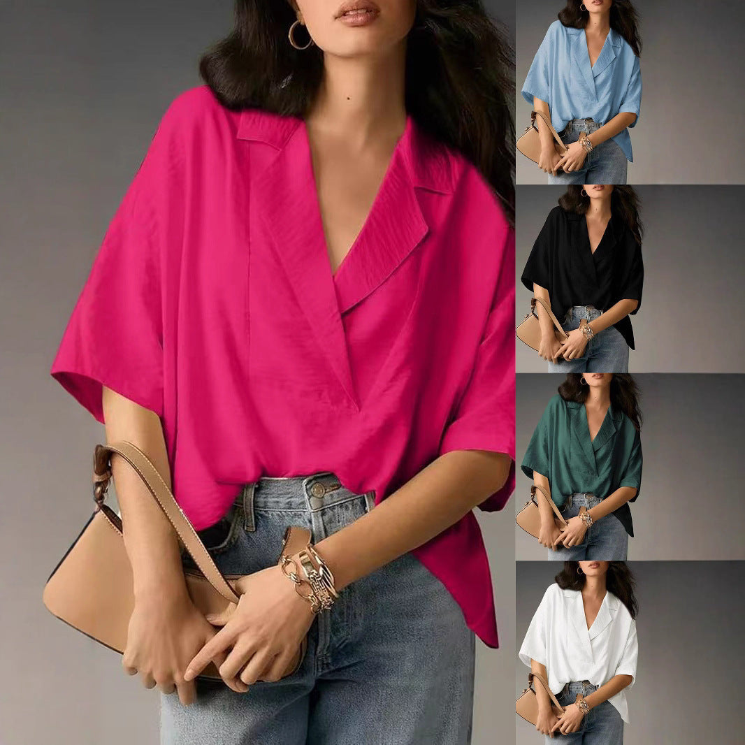 Elegant women's V-neck blouse, perfect for casual or professional wear. Loose fit long sleeve top.
