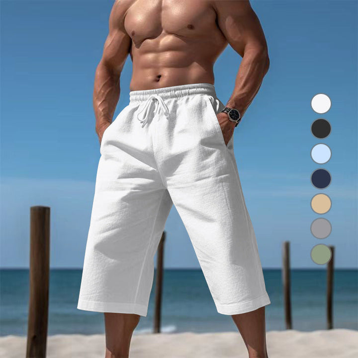 Men's casual beach shorts with elastic waist, perfect for summer vacation & comfort.