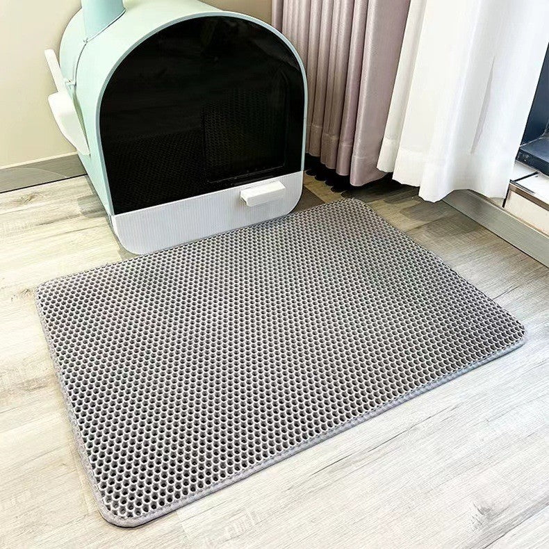 Honeycomb design cat litter mat: effectively traps litter, cleans paws. Non-slip, waterproof for a hygienic pet home.