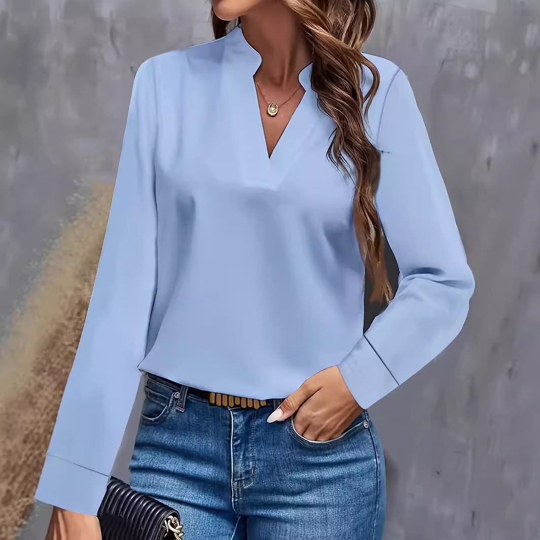 Fashionable women's elegant stand-up collar top, long sleeves for a sophisticated everyday fashion statement.