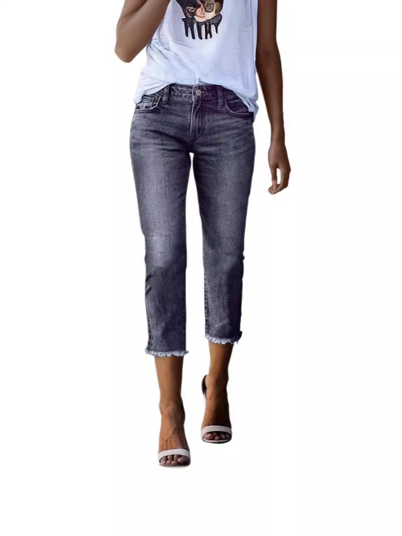 Women's slim fit cropped jeans, high-waisted, ideal for modern everyday and spring fashion.