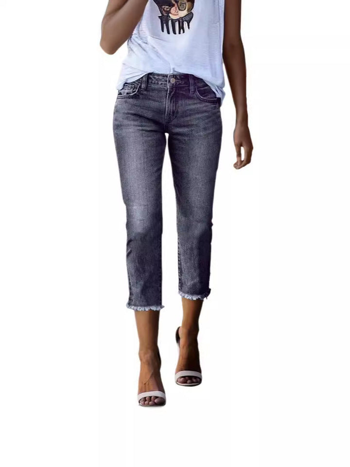 Women's slim fit cropped jeans, high-waisted, ideal for modern everyday and spring fashion.