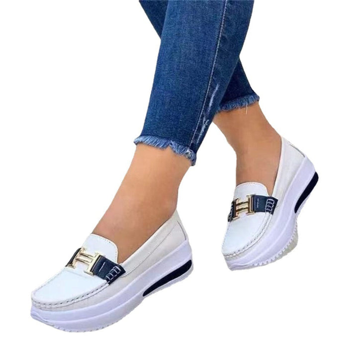 Comfortable women's wedge loafers in a slip-on design, blending casual ease with fashion.