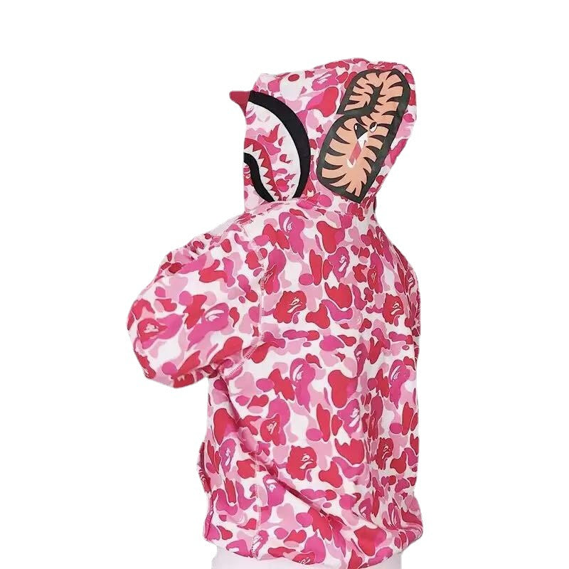 Side profile of women's modern camouflage hoodie. Comfortable activewear top, great for everyday casual style.