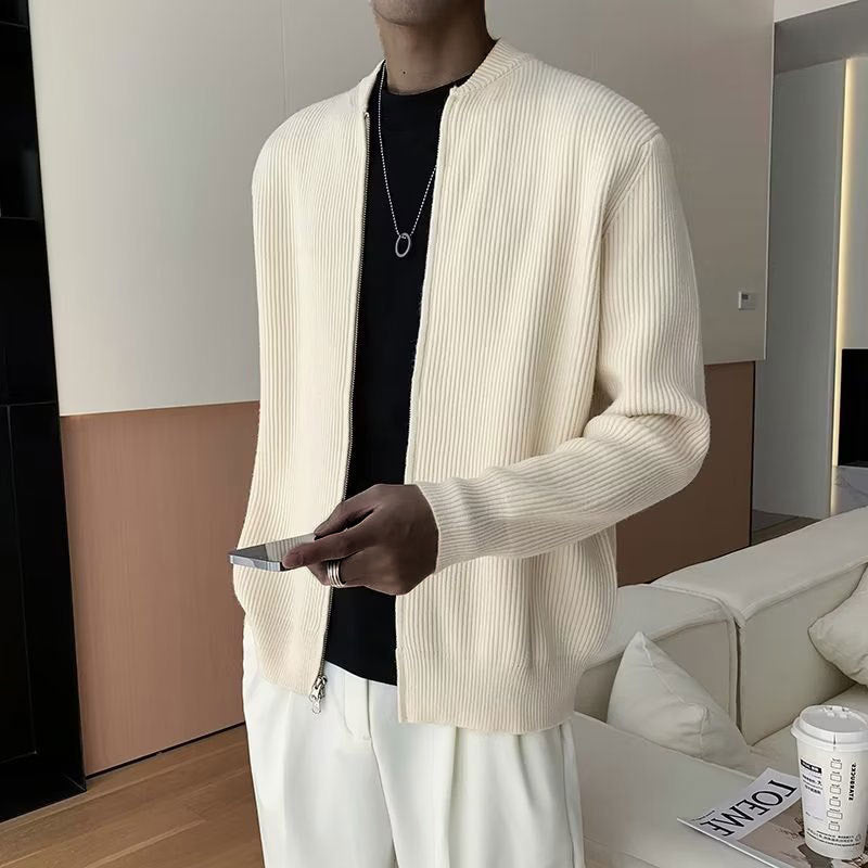 Men's casual zip-up ribbed sweater. Stand collar and long sleeves offer warmth & style for fall and winter.