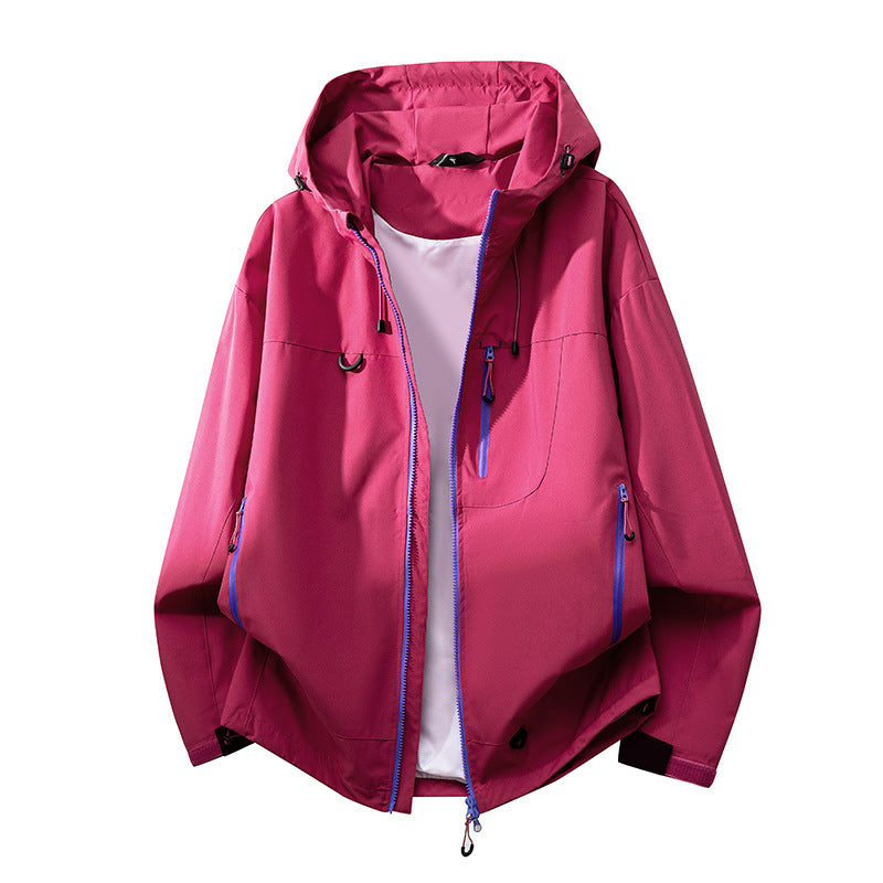 Back view of a women's waterproof windbreaker, technical outdoor jacket, ideal for hiking & activewear.