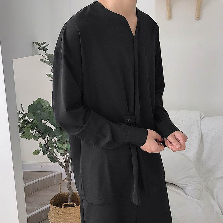 Men's high collar long sleeve t-shirt with functional chest pockets, a practical & stylish top for casual wear.