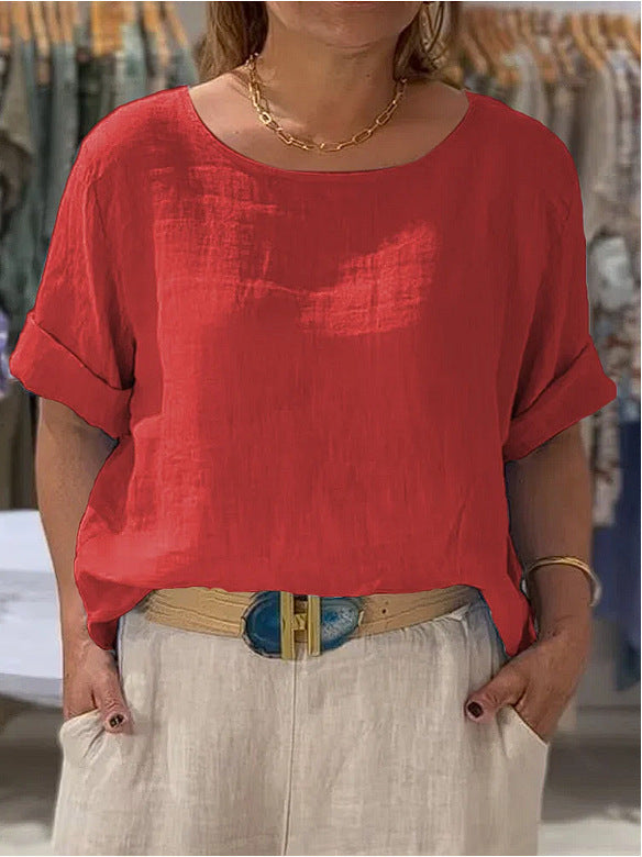 White women's lightweight rolled sleeve blouse, relaxed fit. Perfect casual shirt for any day.