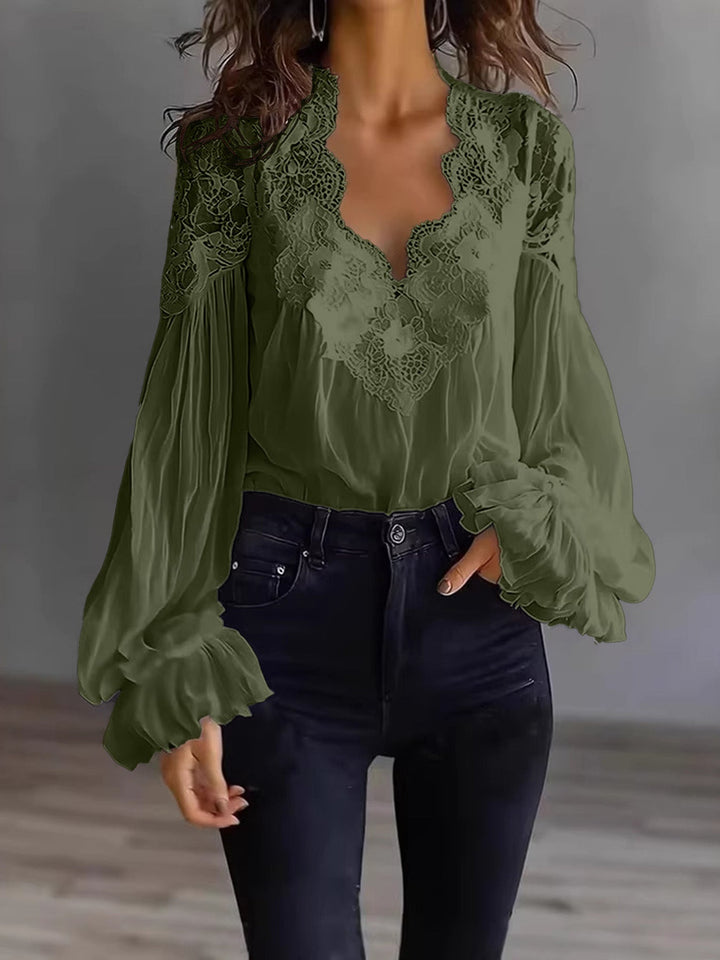 Spring fashion women's lace blouse with airy design and eye-catching ruffle sleeves, very chic.