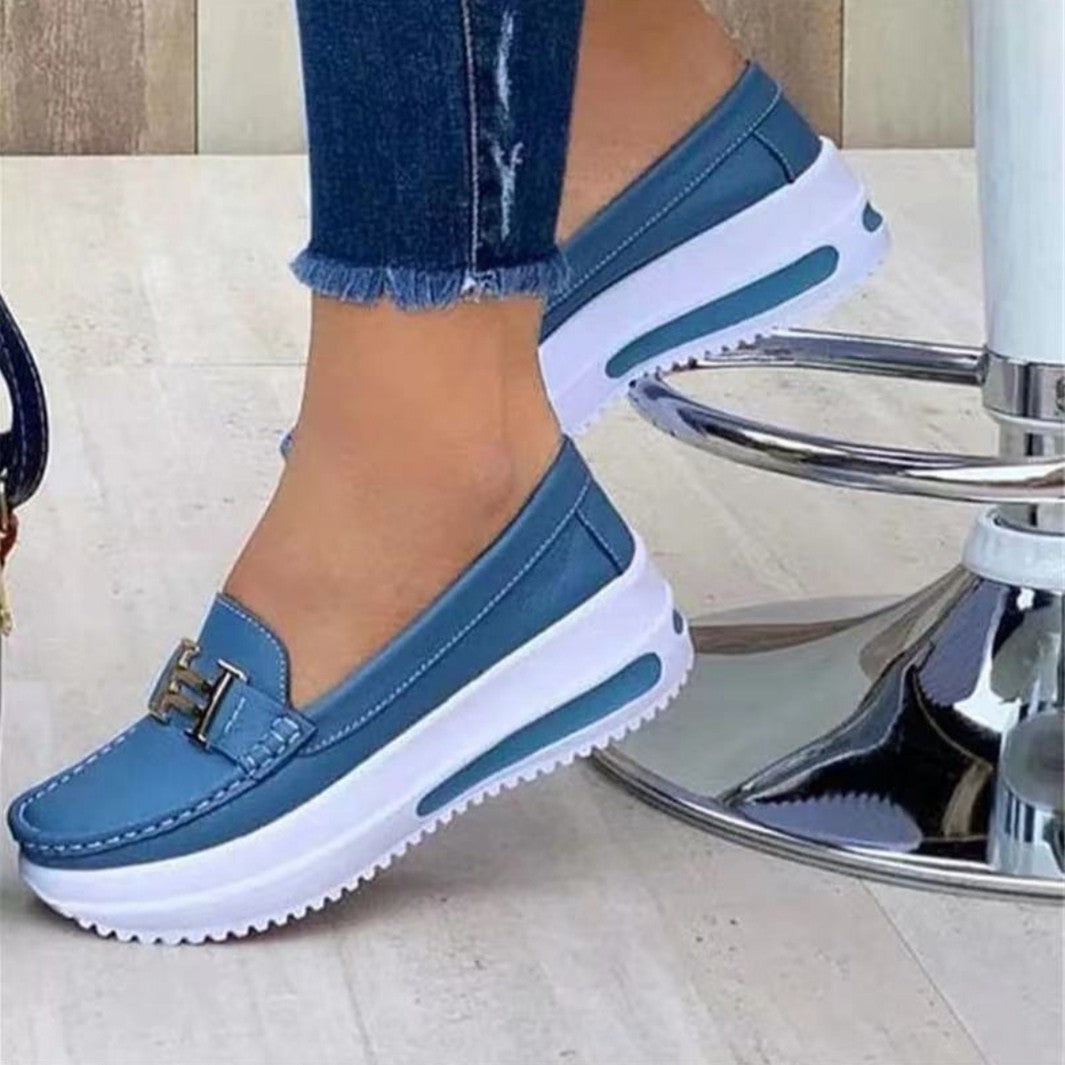 Fashionable women's wedge loafers, a comfortable slip-on design for versatile casual and elegant outfits.