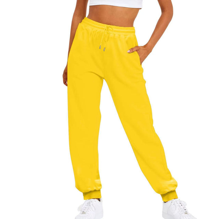Women's activewear pants with a secure elastic waistband and deep side pockets for essentials on the go.
