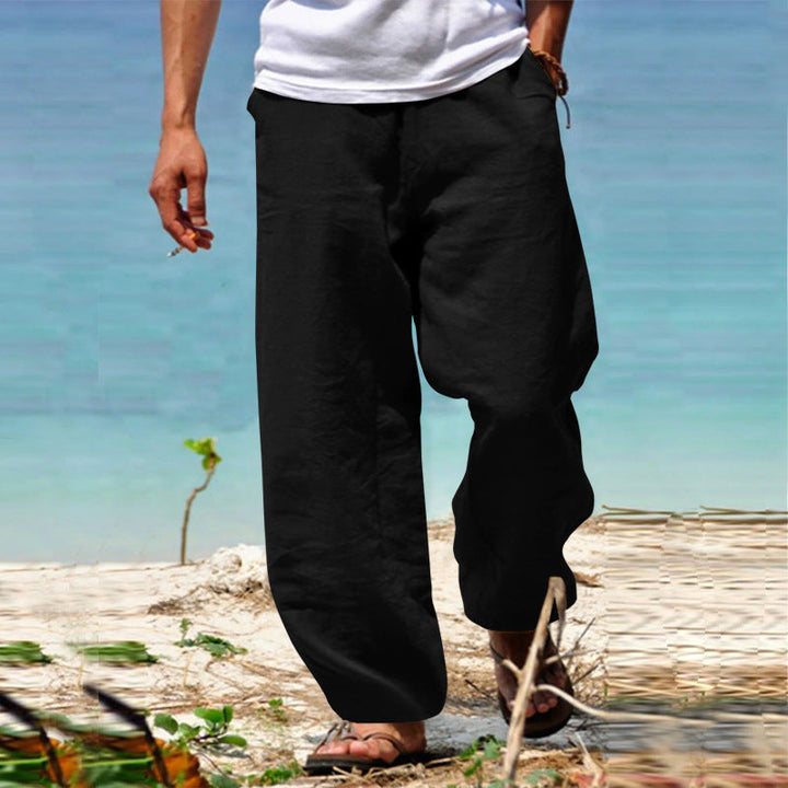 Comfortable men's relaxed fit pants with elastic waist, perfect for warm weather and casual wear.