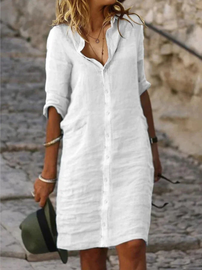 Effortless women's midi shirt dress with button-down front, ideal for casual day wear or chic summer workwear.