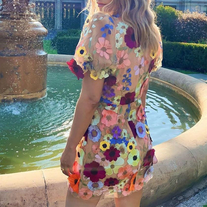 Women's V-neck bodycon midi dress with elegant 3D flower embroidery and chic lantern sleeves.
