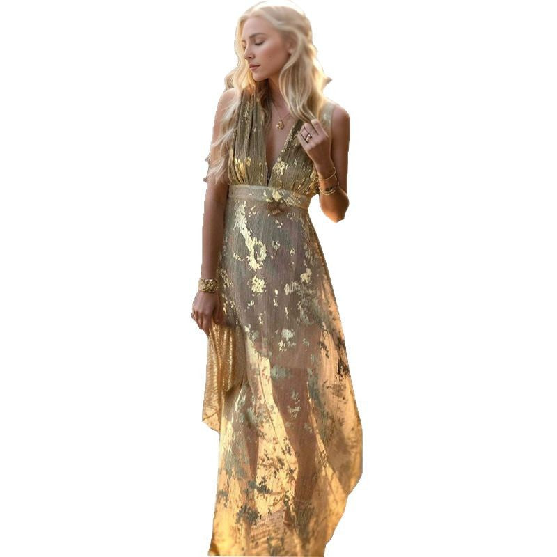 Women's sophisticated V-neck maxi dress, featuring a prominent gold pattern. Elegant long evening wear.