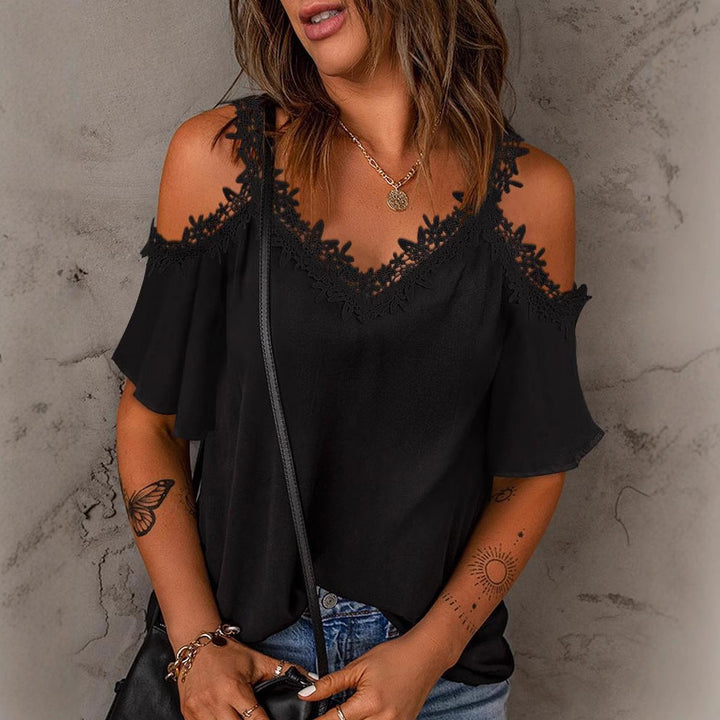 Elegant white lace cold shoulder top for women. Stylish summer blouse, perfect for chic casual wear.