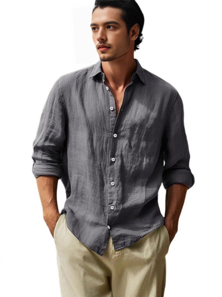 Easy-going men's relaxed fit button-up shirt, a lightweight short-sleeve casual top for summer.
