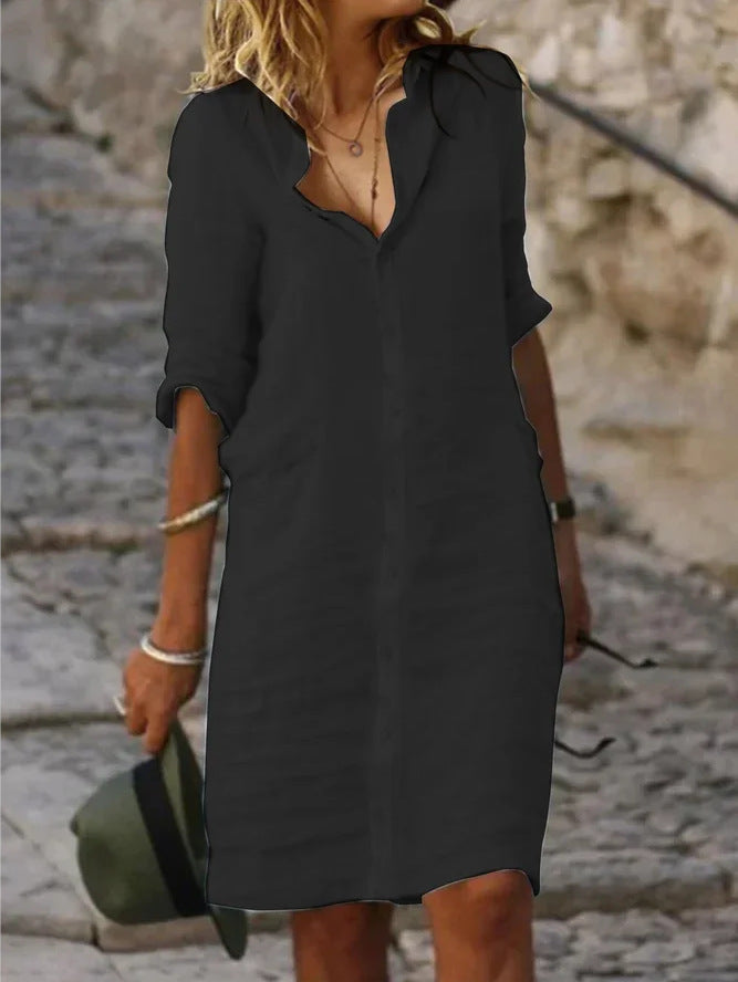 Chic women's button-down shirt dress in a versatile midi length, perfect for spring casual or elegant workwear.
