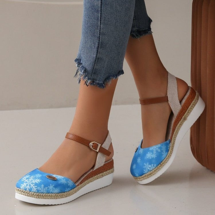 Casual chic women's footwear: comfortable wedge sandals with intricate woven strap detail.