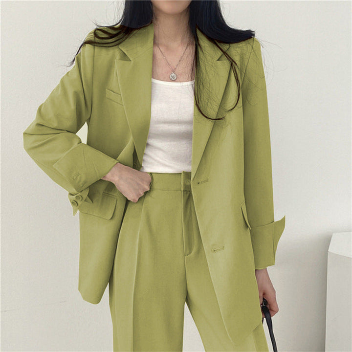 Classic women's elegant tailored blazer and trousers, essential for chic business attire.