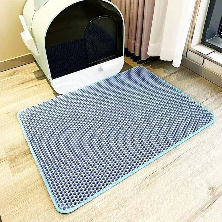 Easy-clean, waterproof cat litter mat with non-slip design. Durable pet mat ensures tidy floors & clean cat paws.