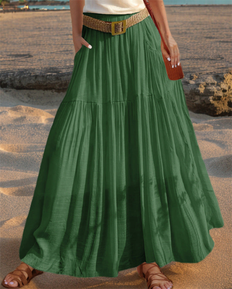 Fashionable women's pleated flowy skirt with pockets, perfect for elegant or casual looks.