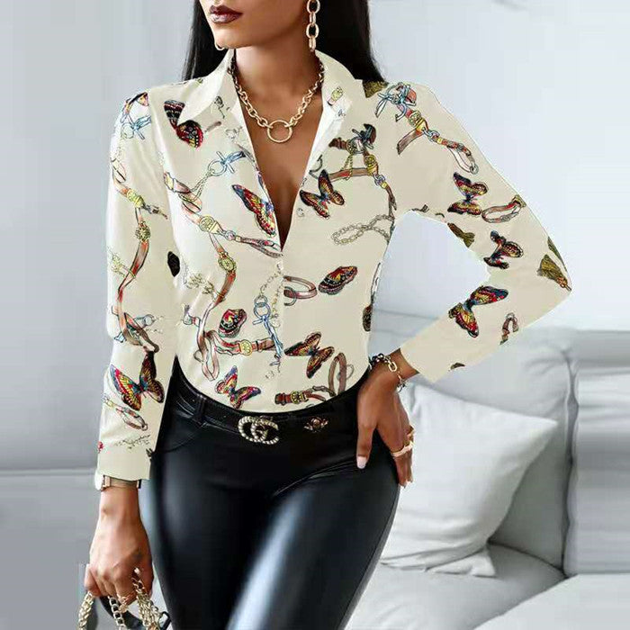 Stylish women's long sleeve button-up shirt, featuring an artistic print, perfect for casual or office elegance.
