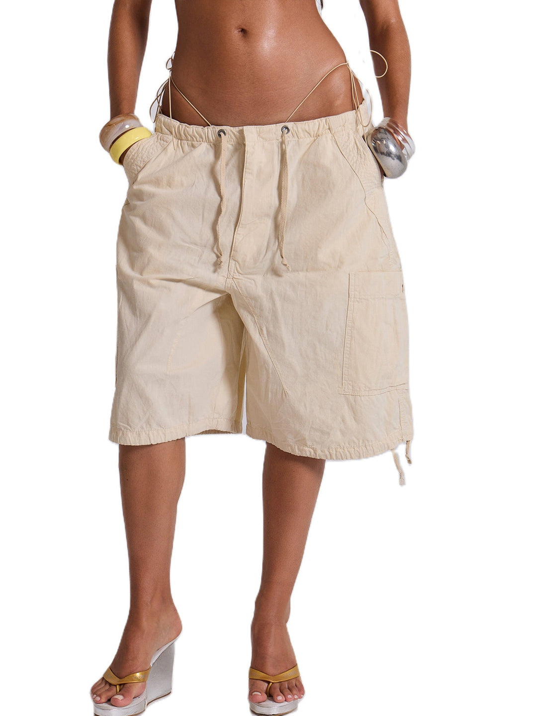Versatile women's cargo shorts in a relaxed fit, complete with utility pockets and an adjustable drawcord waist.