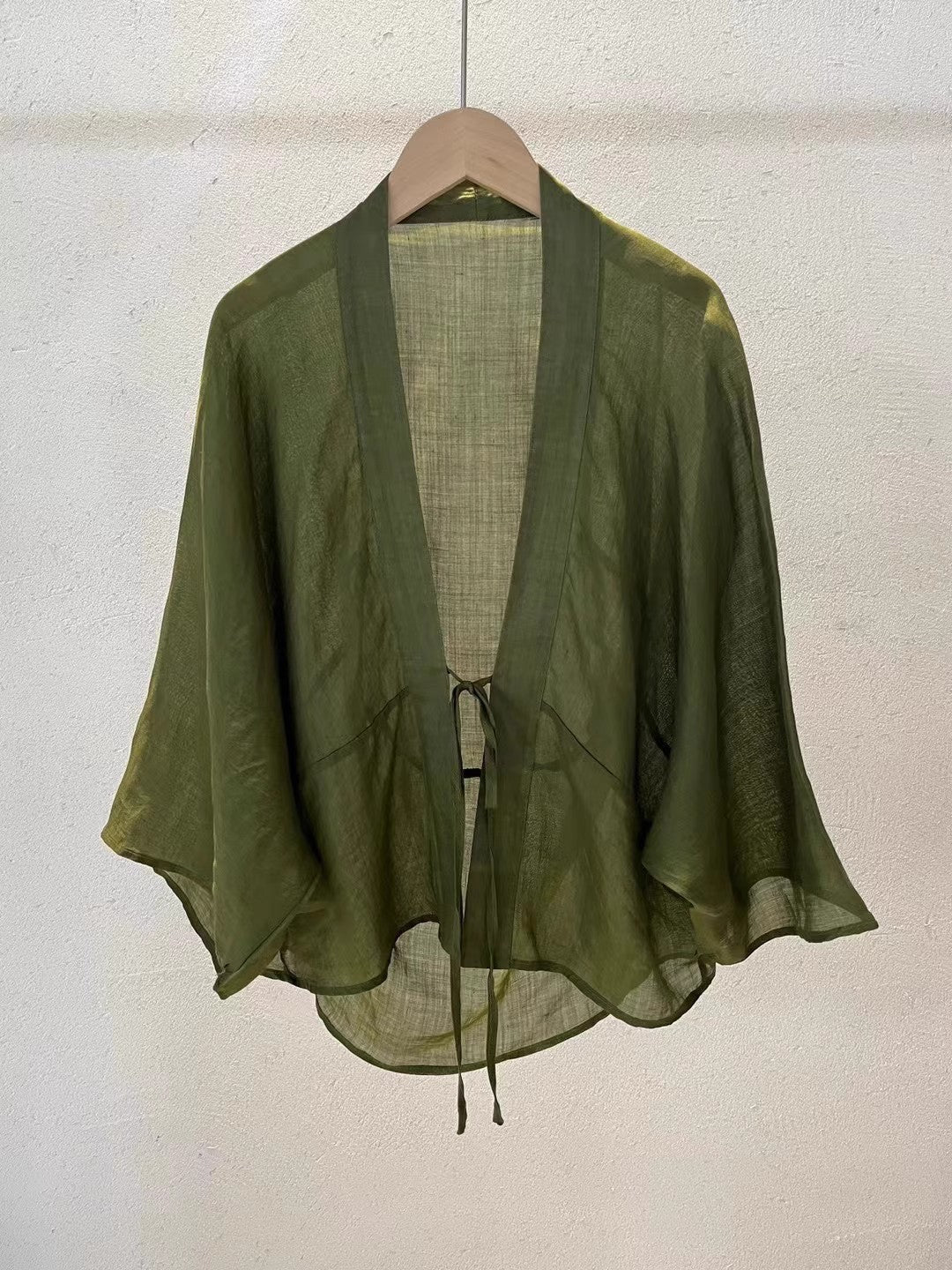 Soft, lightweight sheer wrap jacket for women, a fashionable cardigan and cover-up for a sophisticated look.