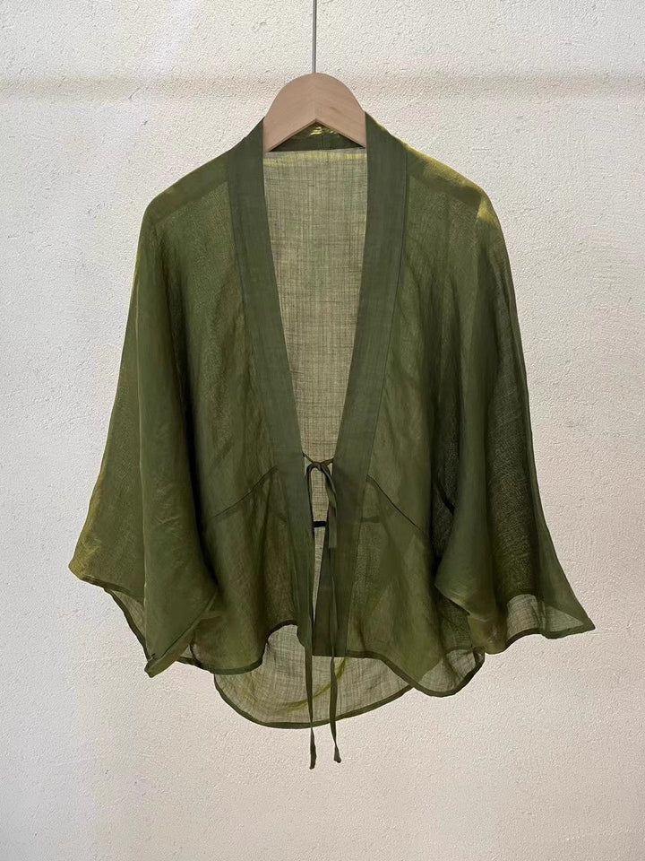 Soft, lightweight sheer wrap jacket for women, a fashionable cardigan and cover-up for a sophisticated look.